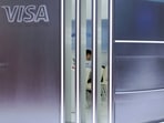 Visa plans to cut 2,600 jobs ahead of earnings as it focuses on efficiency.  (REUTERS/Florence Lo/File Photo)