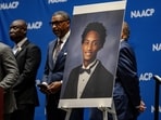A photo of Nolan Wells is displayed on stage where Ben Crump, a lawyer for the family of Nolan Wells announces the results of an independent autopsy on July 22.