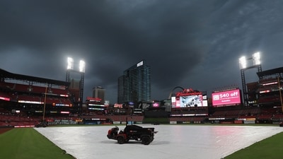 The field at Busch Stadium is covered in anticipation of thunderstorms before a game between the St. Louis Cardinals and the Chicago Cubs. Dilip Vishwanat/Getty Images/AFP (Getty Images via AFP) The field at Busch Stadium is covered in anticipation of thunderstorms before a game between the St. Louis Cardinals and the Chicago Cubs. Dilip Vishwanat/Getty Images/AFP (Getty Images via AFP)