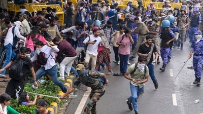 Security personnel carry out a lathi charge during the CJP protest march near the Parliament in New Delhi, India, on Monday, July 20, 2026. (RAJ K RAJ / Hindustan Times)