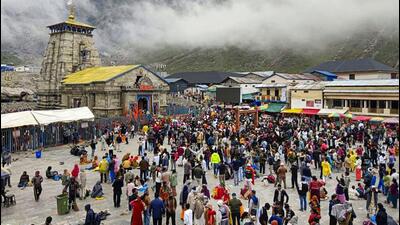 Devotees gather at Kedarnath Dham to offer prayers during the Char Dham Yatra in Rudraprayag. (PTI)