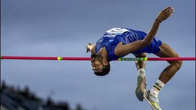 India's Sarvesh Anil Kushare clears the bar during the men's high jump final at the 23rd Commonwealth Games, at Scotstoun Stadium, in Glasgow, Scotland. (PTI)