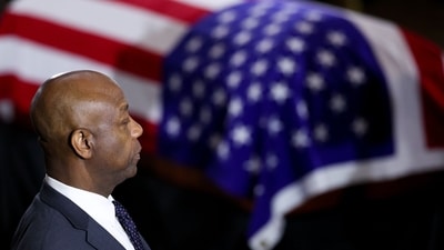 Senator Tim Scott, a Republican from South Carolina, during a ceremony for late Republican Senator Lindsey Graham in the rotunda of the US Capitol in Washington, DC, US, on Tuesday, July 28, 2026. Lindsey Graham, the South Carolina senior senator and foreign policy hawk who changed from a Donald Trump skeptic to one of the US president's strongest allies, died on July 11 at the age of 71. Photographer: Win McNamee/Getty Images/Bloomberg (Bloomberg) Senator Tim Scott, a Republican from South Carolina, during a ceremony for late Republican Senator Lindsey Graham in the rotunda of the US Capitol in Washington, DC, US, on Tuesday, July 28, 2026. Lindsey Graham, the South Carolina senior senator and foreign policy hawk who changed from a Donald Trump skeptic to one of the US president's strongest allies, died on July 11 at the age of 71. Photographer: Win McNamee/Getty Images/Bloomberg (Bloomberg)