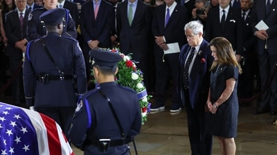 Rep. Sheri Biggs, R-S.C., and Rep. Joe Wilson, R-S.C., pay their respects during a congressional tribute to the late Sen. Lindsey Graham, R-S.C., in the Rotunda of the U.S. Capitol, Tuesday, July 28, 2026, in Washington. (Win McNamee/Pool via AP) (Win McNamee/Pool Getty Images No) Rep. Sheri Biggs, R-S.C., and Rep. Joe Wilson, R-S.C., pay their respects during a congressional tribute to the late Sen. Lindsey Graham, R-S.C., in the Rotunda of the U.S. Capitol, Tuesday, July 28, 2026, in Washington. (Win McNamee/Pool via AP) (Win McNamee/Pool Getty Images No)