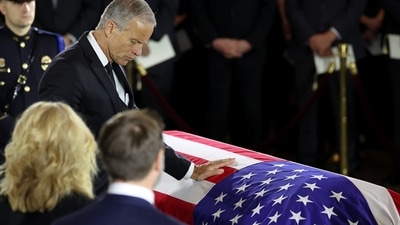Senate Majority Leader John Thune, R-S.D., pays his respects during a congressional tribute to the late Sen. Lindsey Graham, R-S.C., in the Rotunda of the U.S. Capitol, Tuesday, July 28, 2026, in Washington. (Win McNamee/Pool via AP) (Win McNamee/Pool Getty Images No) Senate Majority Leader John Thune, R-S.D., pays his respects during a congressional tribute to the late Sen. Lindsey Graham, R-S.C., in the Rotunda of the U.S. Capitol, Tuesday, July 28, 2026, in Washington. (Win McNamee/Pool via AP) (Win McNamee/Pool Getty Images No)