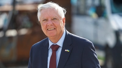 Photos taken on July 10 show U.S. Senator Lindsey Graham speaking to the media after meeting with Ukrainian President Zelensky. (Reuters)