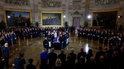An Armed Forces Body Bearer Team next to the casket of late Republican Senator Lindsey Graham during a ceremony in the rotunda of the US Capitol in Washington, DC, US, on Tuesday, July 28, 2026. Tierney L Cross/Pool via REUTERS (via REUTERS)