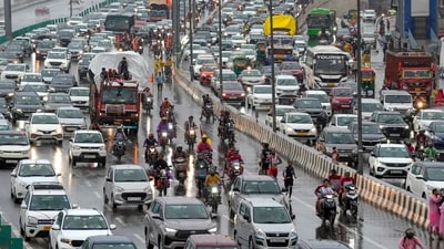 Vehicles got stuck in heavy traffic during rainfall in New Delhi. (PTI) Vehicles got stuck in heavy traffic during rainfall in New Delhi. (PTI)