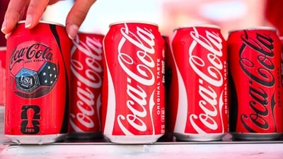 Coca-Cola beats earnings as World Cup sales boost revenue, raises 2026 forecast, while Fairlife resumes production after ransomware cyberattack. (Photo by Patrick T. Fallon / AFP) (AFP) Coca-Cola beats earnings as World Cup sales boost revenue, raises 2026 forecast, while Fairlife resumes production after ransomware cyberattack. (Photo by Patrick T. Fallon / AFP) (AFP)