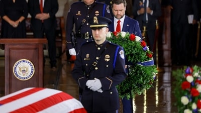 US Vice President JD Vance places a wreath near the casket during a Congressional tribute to late US Senator Lindsey Graham in the Rotunda of the US Capitol in Washington, DC, on July 28, 2026. Graham, a South Carolina Republican and key Trump ally who was elected to the Senate four times, died at age 71 on July 11. (Photo by Tierney L CROSS / POOL / AFP) (AFP) US Vice President JD Vance places a wreath near the casket during a Congressional tribute to late US Senator Lindsey Graham in the Rotunda of the US Capitol in Washington, DC, on July 28, 2026. Graham, a South Carolina Republican and key Trump ally who was elected to the Senate four times, died at age 71 on July 11. (Photo by Tierney L CROSS / POOL / AFP) (AFP)
