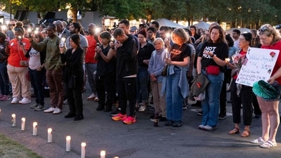 SEATTLE, WASHINGTON - JULY 27: People gather for a vigil a day after the Bite of Seattle food festival shooting at Seattle Center on July 27, 2026 in Seattle, Washington. (Photo by David Ryder / GETTY IMAGES NORTH AMERICA / Getty Images via AFP) (Getty Images via AFP) SEATTLE, WASHINGTON - JULY 27: People gather for a vigil a day after the Bite of Seattle food festival shooting at Seattle Center on July 27, 2026 in Seattle, Washington. (Photo by David Ryder / GETTY IMAGES NORTH AMERICA / Getty Images via AFP) (Getty Images via AFP)