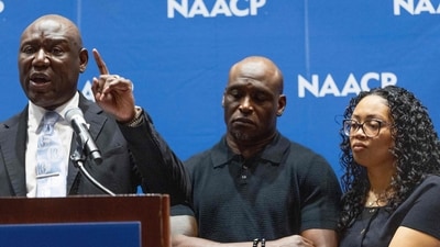 Attorney Ben Crump (L) holds a press conference with Elmore Wonsley (C) and Christine Wells-Wonsley, the parents of Nolan Wells, at the annual NAACP National Convention to announce the results of an independent autopsy as they investigate the death of Wells on July 22, 2026 in Chicago, Illinois. (Photo by SCOTT OLSON / GETTY IMAGES NORTH AMERICA / Getty Images via AFP) (Getty Images via AFP)