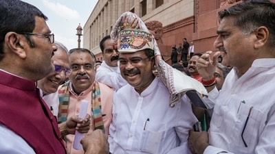 Former education minister Dharmendra Pradhan being greeted during the Monsoon session of Parliament on Monday Former education minister Dharmendra Pradhan being greeted during the Monsoon session of Parliament on Monday