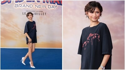 This look proved that Zendaya doesn't need a designer gown to make a statement. For the Paris photocall, she swapped couture for a vintage Spider-Man graphic T-shirt sourced from eBay for just $34.99. Featuring a minimalist laser-cut red illustration of the superhero, the tee was styled with crisp white Christian Louboutin pumps. (Instagram) This look proved that Zendaya doesn't need a designer gown to make a statement. For the Paris photocall, she swapped couture for a vintage Spider-Man graphic T-shirt sourced from eBay for just $34.99. Featuring a minimalist laser-cut red illustration of the superhero, the tee was styled with crisp white Christian Louboutin pumps. (Instagram)