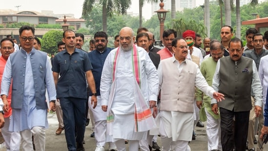 Union ministers Amit Shah (centre), Kiren Rijiju (left) and JP Nadda and Union MoS Jitendra Singh (right) at the Parliament Library Building in New Delhi on Tuesday.