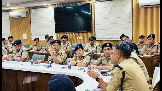 Haridwar SSP Navneet Singh Bhullar briefs Mela Force officials ahead of the Kanwar fair in Haridwar on Tuesday. (HT Photo)