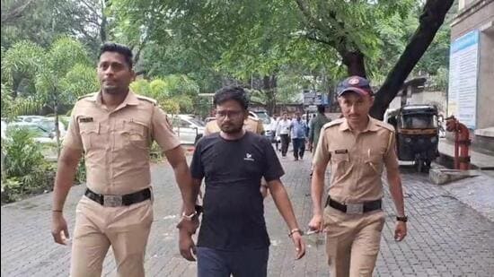 Sonu Kumar Diwakar (in black) was allegedly a key link in the racket who obtained the TET-2026 examination paper from an Agra-based printing press and supplied it to the alleged mastermind, Bijender Gupta.
