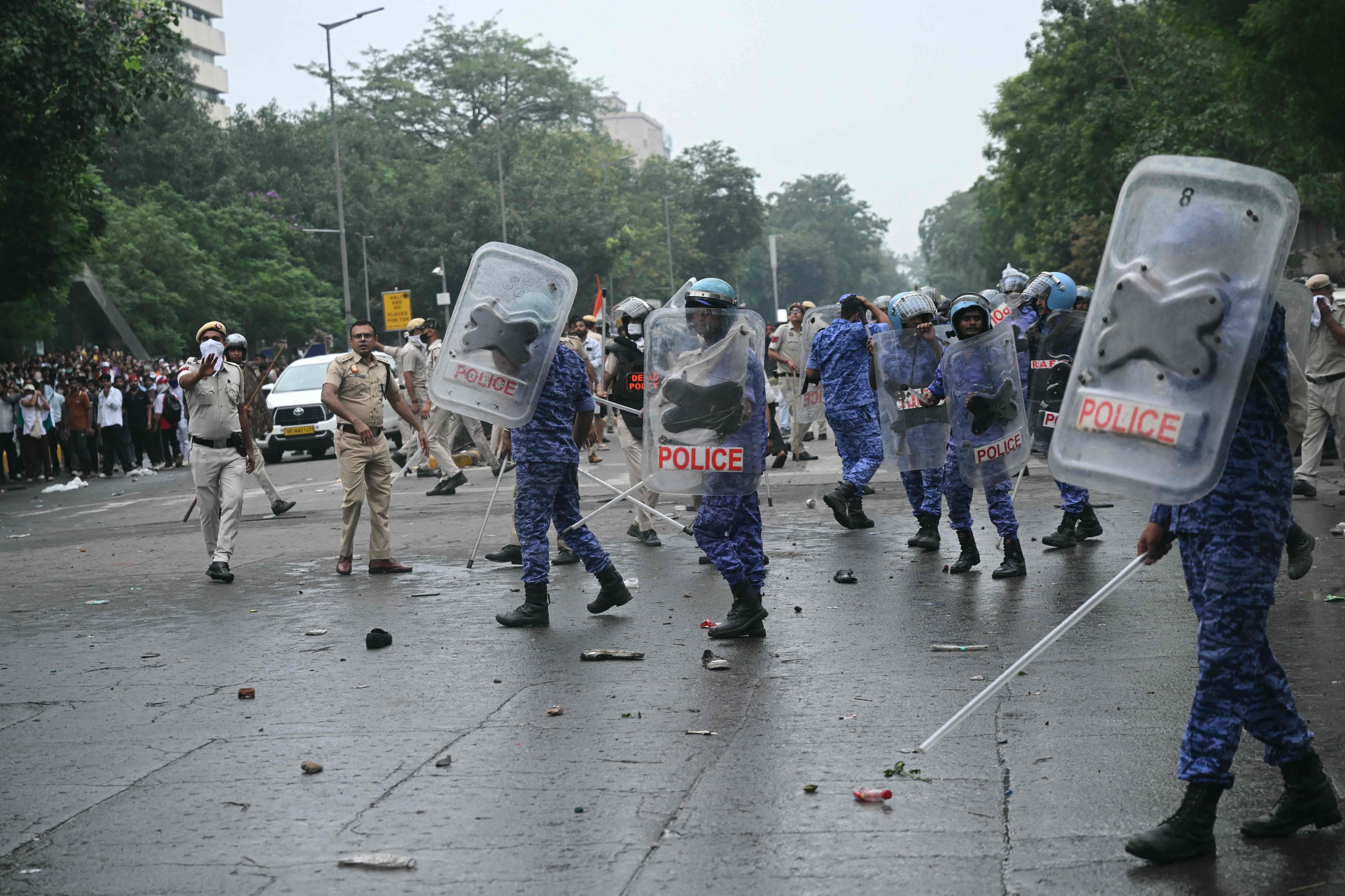 RAF personnel disperse supporters of the Cockroach Janta Party (CJP) during a protest over alleged exam irregularities in New Delhi on July 20, 2026. (File Photo/AFP) RAF personnel disperse supporters of the Cockroach Janta Party (CJP) during a protest over alleged exam irregularities in New Delhi on July 20, 2026. (File Photo/AFP)