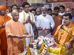 CM Yogi Adityanath attends the concluding ceremony of the seven-day Shri Ram Katha organised to mark Guru Purnima, at Gorakhnath temple, in Gorakhpur on Wednesday. (PTI)