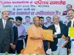 Chief minister Yogi Adityanath during the introductory ceremony of the newly elected executive committee of the Civil Court Bar Association, in Gorakhpur on Tuesday. (@myogiadityanath X/ANI Photo)