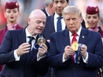 FIFA President Gianni Infantino and U.S. President Donald Trump watch the medal at the award ceremony.
