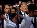 Videos shared online showed Trump passing Tic Tacs to JD Vance while seated in the front row. (Photo by Andrew Harnik / GETTY IMAGES NORTH AMERICA / Getty Images via AFP)