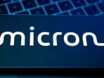 Micron stock plunged after the AI chip selloff, but Wall Street remains bullish on its long-term outlook. Here's whether shares can reach $1,300. (REUTERS/Dado Ruvic/Illustration/File Photo)