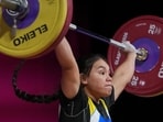 Nauru's Femily-Crystie Notte won bronze in the women's 63kg weightlifting final at the Commonwealth Games in Glasgow, Scotland, Tuesday. (AP Photo)