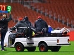 Cruzeiro's Gabriel Pec is stretchered off after sustaining an injury 