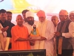 The UP CM made the announcement while addressing the Samajik Samarasta Sankalp meeting at Seer Goverdhanpur, the birthplace of Sant Ravidas, after offering prayers at the Sant Ravidas temple (Rajesh kumar/HT)