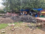 The material has remained unattended since May after road recarpeting. Residents cite respiratory issues, while MCG says removal will begin after monsoon. (HT)