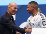 Zinedine Zidane and Kylian Mbappe in an event,