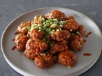 Aathira Sethumadhavan's low-calorie bang bang chicken recipe features air-fried chicken tossed in a creamy sauce. 
