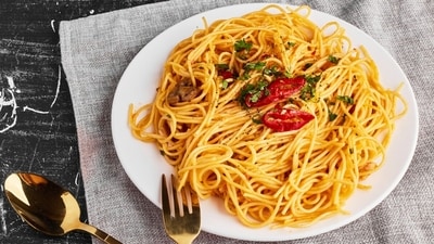 Need comfort food fast? Try chef Sanjeev Kapoor’s chilli garlic spaghetti recipe. (Freepik) Need comfort food fast? Try chef Sanjeev Kapoor’s chilli garlic spaghetti recipe. (Freepik)