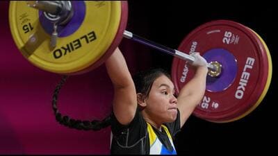 Nauru's Femily-Crystie Notte won bronze in the women's 63kg weightlifting final at the Commonwealth Games in Glasgow, Scotland, Tuesday. (AP Photo) Nauru's Femily-Crystie Notte won bronze in the women's 63kg weightlifting final at the Commonwealth Games in Glasgow, Scotland, Tuesday. (AP Photo)