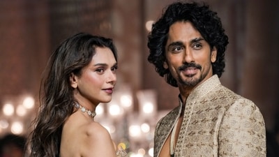 Aditi Rao Hydari walks the ramp with her husband Siddharth during the presentation of designer Jayanti Reddy's collection at India Couture Week. (PTI) Aditi Rao Hydari walks the ramp with her husband Siddharth during the presentation of designer Jayanti Reddy's collection at India Couture Week. (PTI)