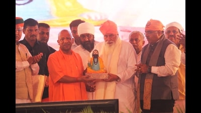 The UP CM made the announcement while addressing the Samajik Samarasta Sankalp meeting at Seer Goverdhanpur, the birthplace of Sant Ravidas, after offering prayers at the Sant Ravidas temple (Rajesh kumar/HT) The UP CM made the announcement while addressing the Samajik Samarasta Sankalp meeting at Seer Goverdhanpur, the birthplace of Sant Ravidas, after offering prayers at the Sant Ravidas temple (Rajesh kumar/HT)