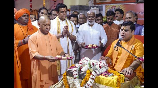 CM Yogi Adityanath attends the concluding ceremony of the seven-day Shri Ram Katha organised to mark Guru Purnima, at Gorakhnath temple, in Gorakhpur on Wednesday. (PTI)