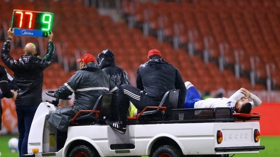 Cruzeiro's Gabriel Pec is stretchered off after sustaining an injury 