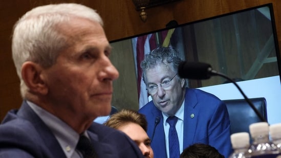 Committee Chairman US Sen Rand Paul (R-KY) is shown on a monitor as former NIH Director Anthony Fauci (L) testifies before the Senate Homeland Security and Governmental Affairs Committee hearing on July 29, 2026 in Washington, DC.