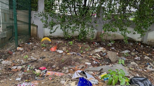 Illegally dumped garbage in a green belt in Sector 43 near Galaxy Apartments, as seen on Tuesday. (Parveen Kumar/HT)