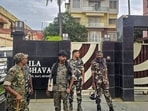 Birbhum: Security officials stand guard outside the residence of absconding stone trader Tullu Mondal, during a raid, at Suri in West Bengal's Birbhum district, Thursday, July 30, 2026 (PTI)