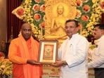 Culture minister felicitating Buddhist monk in Sarnath. (HT photo)