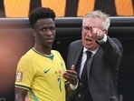 Brazil's Italian head coach Carlo Ancelotti speaks with Brazil's forward #07 Vinicius Junior during the 2026 World Cup round of 16 football match