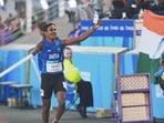 India’s para-athlete Dilip Mahadu Gavit celebrates after winning the gold medal in men's 100m T47 final with a record time of 10.71 seconds at the Commonwealth Games in Glasgow. (PTI)