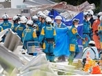 Rescue workers conduct a search operation at the damaged Aeon Mall shopping centre after an earthquake with a magnitude of 7.1 struck Japan's southern Kumamoto Prefecture, in Kashima Town, Kumamoto Prefecture, Japan, July 30, 2026. REUTERS/Kim Kyung-Hoon
