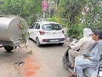 MC parked a tanker near the road cave in Mint Ghumari Chowk in Ludhiana on Wednesday in Ludhiana. (Gurpreet Singh/HT)
