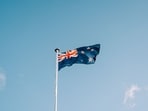 New Zealand flag photo. (Unsplash)