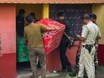 Police seize cash worth several crores of rupees and kilograms of gold during a raid at the residence of former government bus driver-turned-stone trader Minar Mondal. Police seize cash worth several crores of rupees and kilograms of gold during a raid at the residence of former government bus driver-turned-stone trader Minar Mondal.