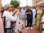 TMC MP Kalyan Banerjee stage a protest as Congress MPs Priyanka Gandhi Vadra, Imran Masood, MP Pappu Yadav and others look on during the Monsoon session of Parliament, in New Delhi.